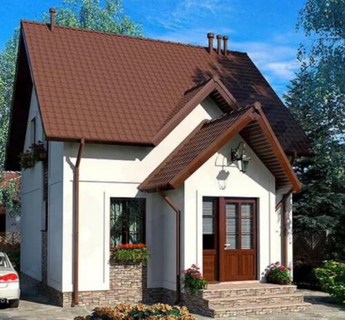 Компактные двухэтажные загородные дома: удобно и стильно. 01