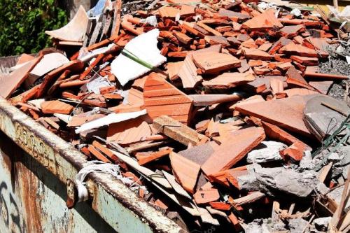 Контейнер для строительного мусора. Вывоз строительного мусора при помощи мусорного контейнера