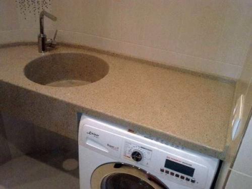 Раковина со скрытым сливом. Раковина над стиральной машиной: виды 04