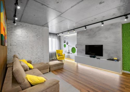 Как декорировать бетонную стену. Интерьер с бетонными стенами. Новый тренд в интерьерах