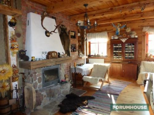 Отделка стен деревом и камнем. Древесина в интерьере деревянного дома