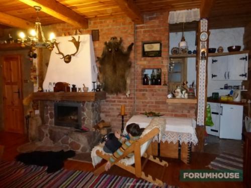 Отделка стен деревом и камнем. Древесина в интерьере деревянного дома