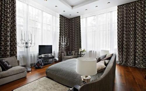 Интерьер комнаты с двумя окнами на одной стене. Особенности планировки