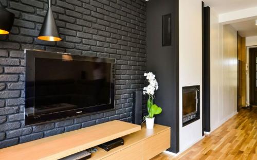 Белая кирпичная стена в интерьере с чем сочетается. Преимущества и недостатки