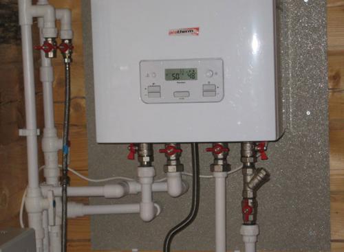 Правильное подключение системы отопления к котлу. Этап первый: монтаж котла 01