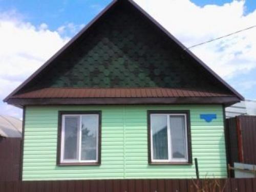 Как украсить фронтон дома. Материалы для обшивки стен чердака 08