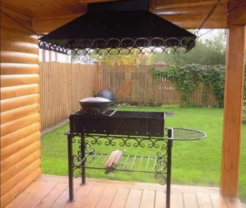 Деревянная беседка с мангалом. Особенности беседки с мангалом