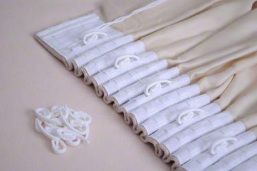 Как вешать шторы на крючки. Преимущества шторной ленты