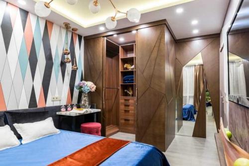 Спальня с гардеробной планировка. Гардеробная в спальне — примеры идеального размещения и сочетания гардероба в интерьере спальни (100 фото)